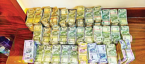 The cash seized from the house of Superintendent Engineer H M Janardhana in Bengaluru Rural