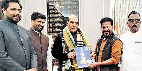 Chief Minister A Revanth Reddy presents a memento to Defence Minister Rajnath Singh in New Delhi on Thursday