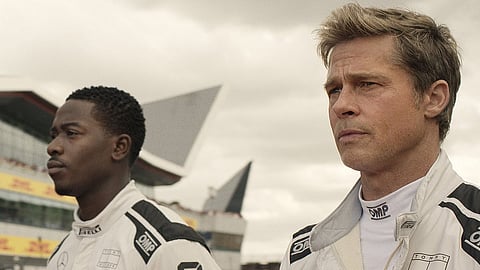 Damson Idris (L) and Brad Pitt (R) in F1