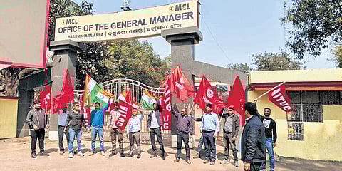 Agitators staging protest in front of MCL office in Sundargarh district on Thursday.