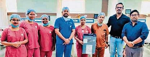 SUMUM doctors and health staff with the patient.