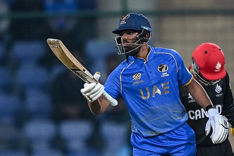 UAE's Aryansh Sharma celebrates after scoring a half-century (50 runs) during the 2026 ICC Men's T20 Cricket World Cup group stage match between Canada and United Arab Emirates at the Arun Jaitley Stadium in New Delhi.