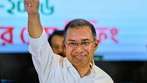 Bangladesh Nationalist Party Chairperson Tarique Rahman shows victory sign during a meeting with media after his party won the national parliamentary election, in Dhaka, Bangladesh, Saturday, Feb. 14, 2026.