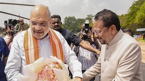 Union Home Minister Amit Shah being welcomed by Puducherry Lt. Governor K. Kailashnathan upon his arrival to attend a public meeting, in Karaikal, Puducherry, Saturday, Feb. 14, 2026.