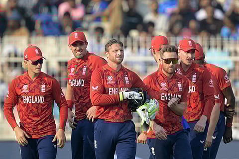 England's players celebrate after the dismissal of Scotland's Michael Leask during the 2026 ICC Men's T20 Cricket World Cup group stage match between England and Scotland at the Eden Gardens in Kolkata.