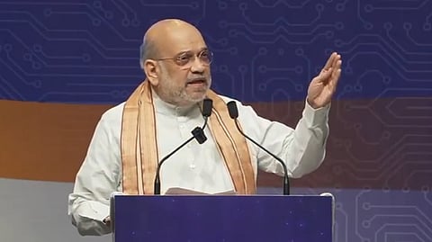 Union Home Minister Amit Shah addresses a rally in Gandhinagar on Sunday, Feb. 15, 2026.