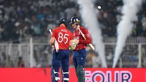 England's Will Jacks, left, and batting partner Tom Banton celebrate after England won the T20 World Cup cricket match against Scotland in Kolkata, India, Saturday, Feb. 14, 2026.