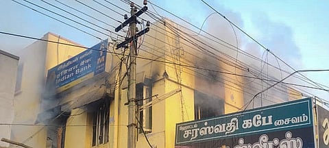 A fire broke out at an Indian Bank branch in Sankarankovil on Monday morning.