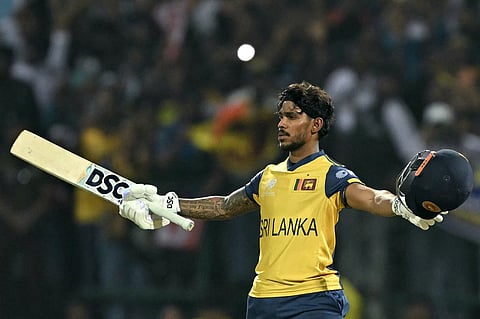 Sri Lanka's Pathum Nissanka celebrates after scoring a century during the 2026 ICC Men's T20 Cricket World Cup group stage match between Australia and Sri Lanka at Pallekele International Cricket Stadium in Kandy.