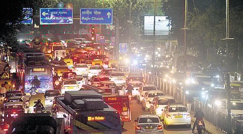 Commuters stuck in traffic near Bharat Mandapam on Monday.