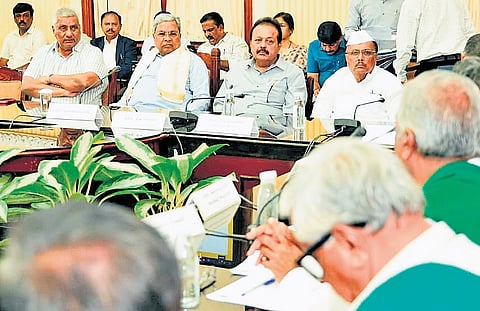 Chief Minister Siddaramaiah chairs a pre-budget meeting with farmers at
Vidhana Soudha in Bengaluru on Tuiesday