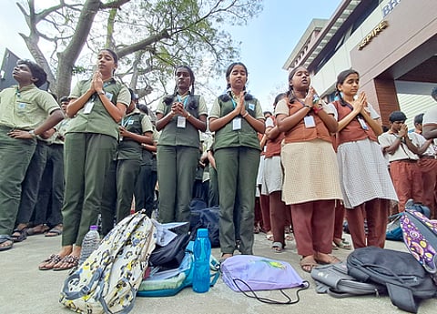 Class 12th students seen preparing and praying before appearing for TN state board examinations
