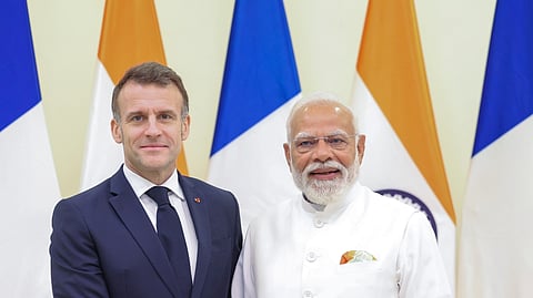 In this image received on Feb. 17, 2026, Prime Minister Narendra Modi with French President Emmanuel Macron during a meeting, in Mumbai.