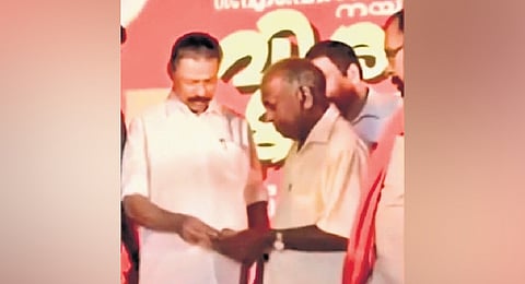 M V Govindan with pension beneficiary Moideen during the LDF rally in Balussery