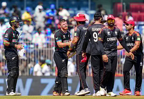 New Zealand's Glenn Phillips shakes hands with Canada's players after New Zealand won the ICC Men's T20 World Cup 2026 cricket match between New Zealand and Canada at the MA Chidambaram Stadium, in Chennai, Tuesday, Feb. 17, 2026.