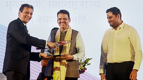 Maharashtra CM Devendra Fadnavis and FedEx CEO and President Raj Subramaniam during the groundbreaking ceremony of the FedEx Hub at Navi Mumbai International Airport.