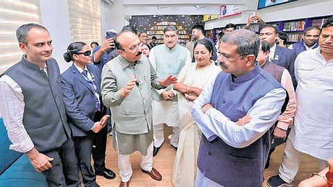 CM Rekha Gupta along with Union Education Minister Dharmendra Pradhan and Delhi Education Minister Ashish Sood at the inauguration in Sarojini Nagar.