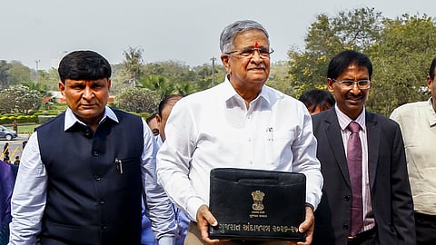 Gujarat Finance Minister Kanu Desai before the presentation of the state Budget 2026-27 during the Budget session of the state Assembly, in Gandhinagar.