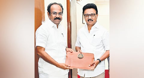 Finance Minister Thangam Thennarasu greets CM MK Stalin before presenting the interim budget