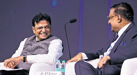 Minister D Sridhar Babu shares a lighter moment with a fellow panel member during the valedictory session of Bio Asia 2026 at HITEX in Hyderabad on Wednesday.