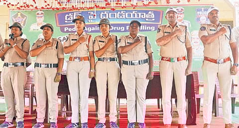 Tiruvuru CI Giribabu and other officers takes part in the bicycle rally against drugs in Tiruvuru division on Wednesday.