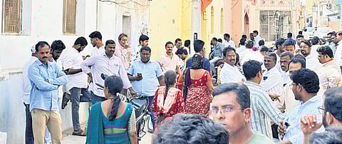 Supporters of Sanganabatla Dinesh gather at his residence in Dharmapuri