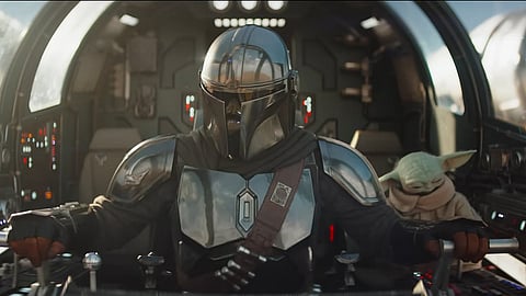 A still from The Mandalorian and Grogu