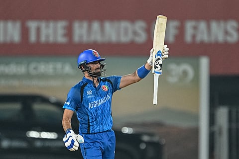 Afghanistan's Ibrahim Zadran celebrates after scoring a half-century (50 runs) during the 2026 ICC Men's T20 Cricket World Cup group stage match between Afghanistan and Canada at the MA Chidambaram Stadium in Chennai.