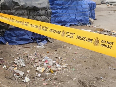 An auto driver who was sitting in his auto was injured after one of the labourers fell on the vehicle.