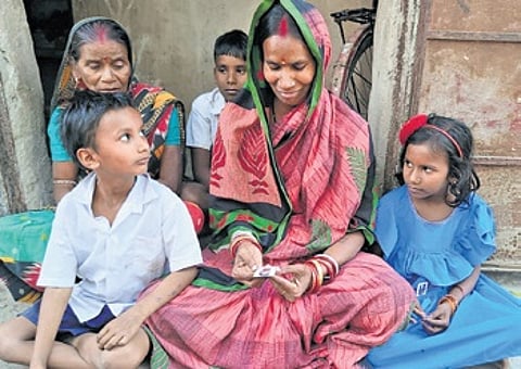 Family members of stranded worker Yasobant Sahoo.