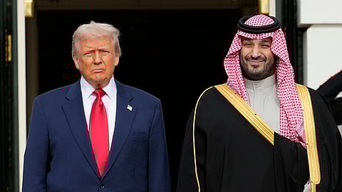US President Donald Trump stands with Saudi Arabia's Crown Prince Mohammed bin Salman on his visit to the White House, Nov. 18, 2025, in Washington.