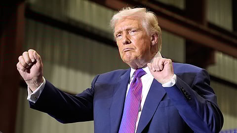 US President Donald Trump dances after speaking at Coosa Steel Corporation in Rome, Ga., Thursday, Feb. 19, 2026.