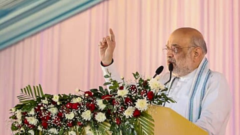 Union Home Minister Amit Shah speaks during the launch of the Vibrant Villages Programme-II, in Cachar district of Assam, Friday, Feb. 20, 2026.