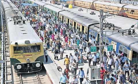 Stranded commuters at Egmore on Friday.