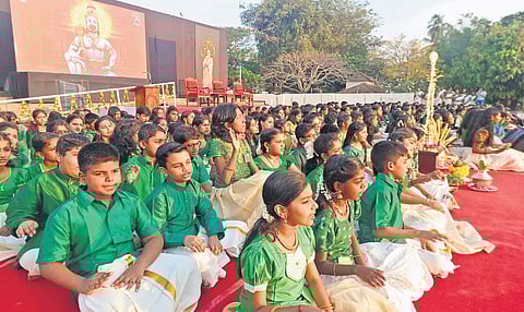 Children participate in the ‘Anantham Swaroopam’ event at Putharikandam Mainthanam, where Chinmaya Mission global head Swami Swaroopananda was given a welcome on Friday.
