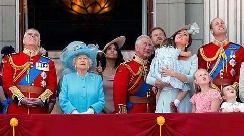 From left, Britain's Prince Andrew, Queen Elizabeth, Meghan Duchess of Sussex, Prince Charles, Prince Harry, Kate Duchess of Cambridge, and Prince William attend the annual Trooping the Colour Ceremony in London, Saturday, June 9, 2018.