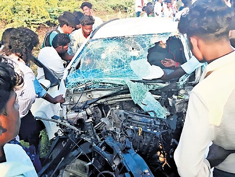 The mangled remains of the vehicles involved in the accident