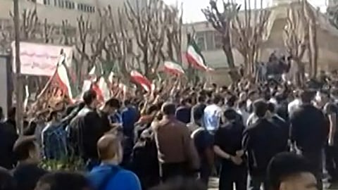 This video grab, taken from UGC images posted on social media and verified by AFPTV teams in Paris on February 21, 2026, shows Iranians clashing near the Department of Aerospace Engineering of Sharif University in Tehran.
