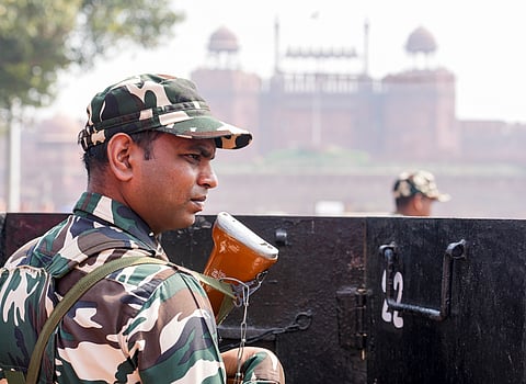 A security officer keeps vigil amid high alert in the national capital, near Red Fort, in New Delhi, Saturday, Feb. 21, 2026. Security was tightened across key religious and heritage sites in Delhi on Saturday, including in areas around the Red Fort and parts of Chandni Chowk, following intelligence inputs suggesting a possible terror threat, an official said.