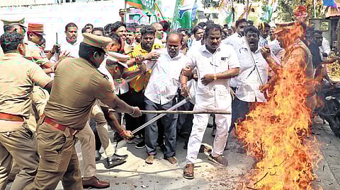 Police resort to lathi-charge to disperse the cadre in Puducherry.