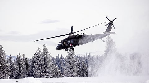 A U.S. Army Blackhawk helicopter lifts off on a mission to recover skiers who died during an avalanche, in Truckee, Calif., Saturday, Feb. 21, 2026.