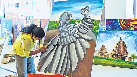 An artist at work during the national art camp in Bengaluru on Sunday.