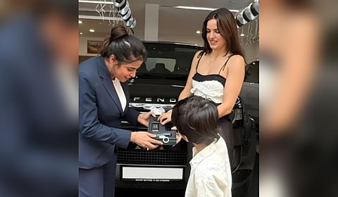 Agastya receives the keys to the Land Rover Defender.