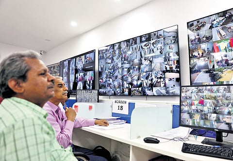Officials monitor CCTV feeds from Intermediate exam centres at the state command control room in Hyderabad on Monday.