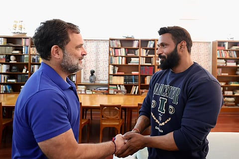 Lok Sabha LoP and Congress MP Rahul Gandhi meets Gym trainer Deepak, who defended Advocate Ahmed’s Baba School Dress & Matching Centre in Kotdwar.