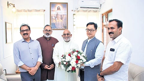 Union Minister Kiren Rijiju greets Syro-Malabar Church Major Archbishop Mar Raphael Thattil at St Thomas Mount, Kakkanad, on Monday. (From L) Twenty20 chairman Sabu Jacob, BJP state president Rajeev Chandrasekhar and vice-president Shone George are also seen