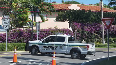 A Palm Beach County Sheriff vehicle blocks traffic near Mar-a-Lago, Sunday, Feb. 22, 2026, in Palm Beach, Fla