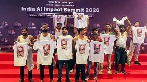 Indian Youth Congress workers stage a protest at Bharat Mandapam during the India AI Impact Summit 2026 in New Delhi on Friday, Feb. 20, 2026.