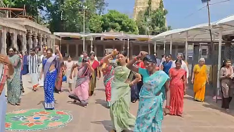 Chenchu men and women arrived in traditional attire, playing tappeta drums and performing vibrant folk dances before proceeding for the darshan.
