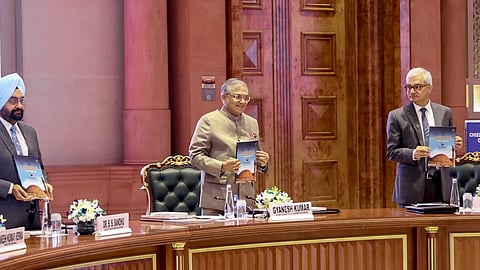 Chief Election Commissioner Gyanesh Kumar with Election Commissioners Sukhbir Singh Sandhu and Vivek Joshi during the launch of "A Confluence of Democracies", book documenting the India International Conference on Democracy and Election Management-2026, at Bharat Mandapam, New Delhi.